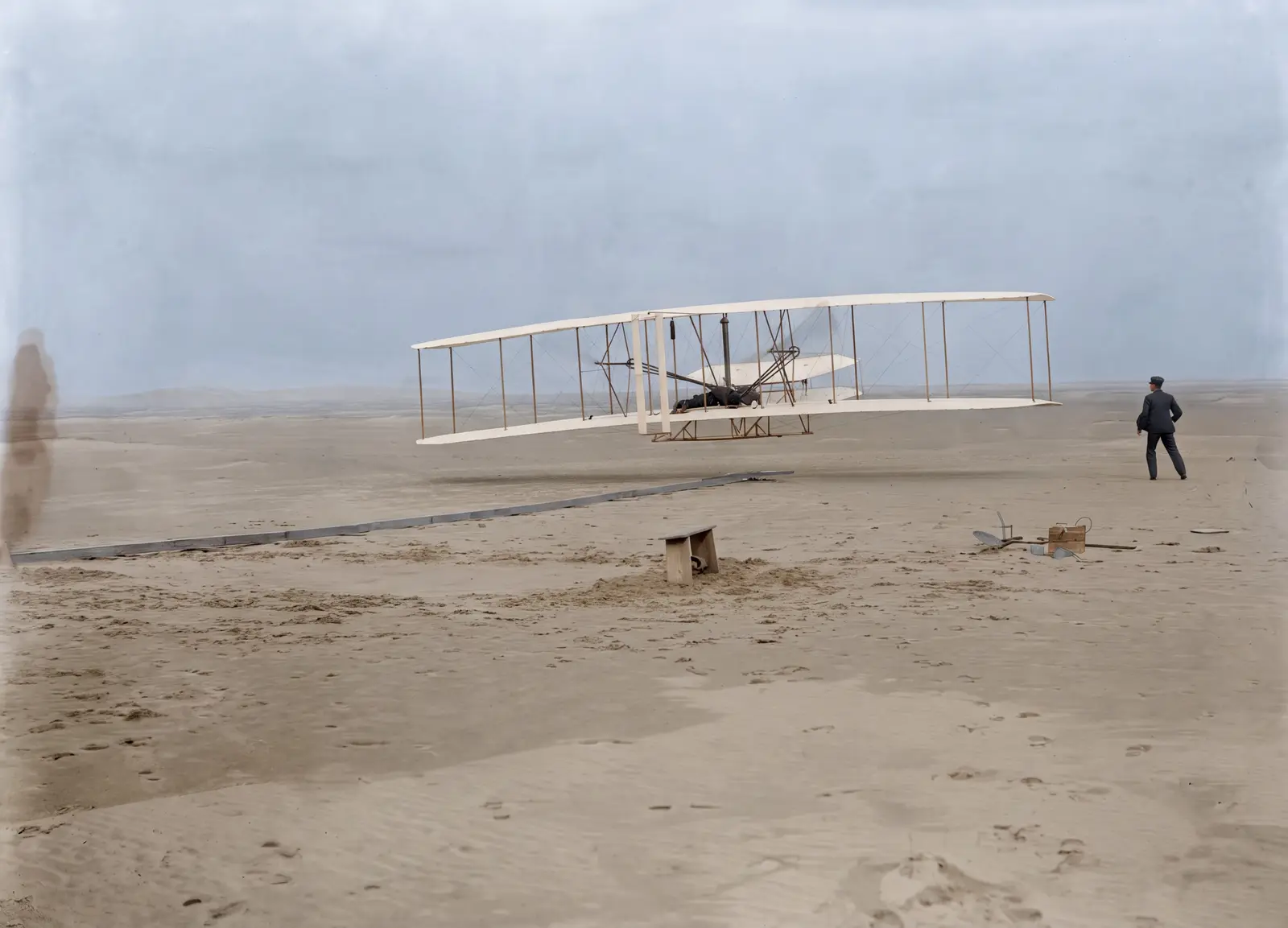 The same photograph restored and in color — the corner filled with sand, the blotches gone